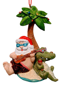 Beach Santa Ornament with an Alligator Sitting Under a Palm Tree