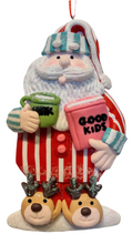 Load image into Gallery viewer, Clay Dough Santa or Snowman Ornament Wearing Pajamas
