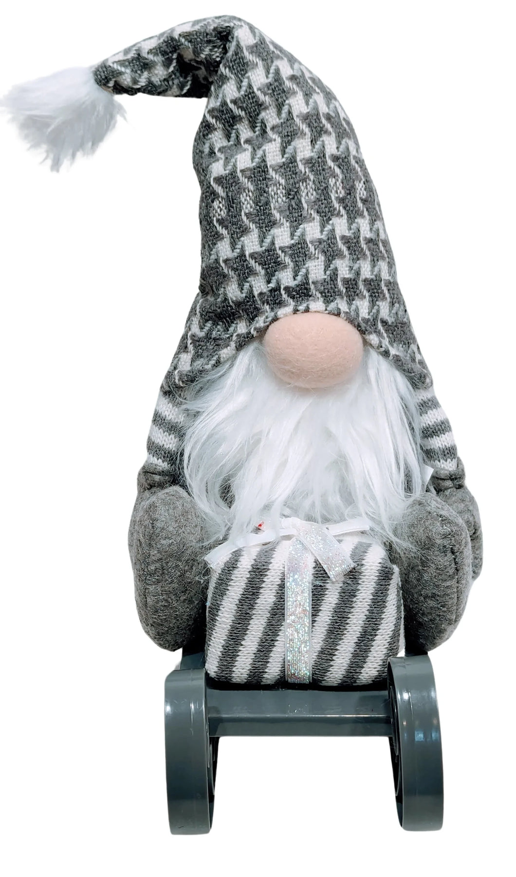 Gray Gnome Sitting on Gray Sled Holding a Christmas Gift