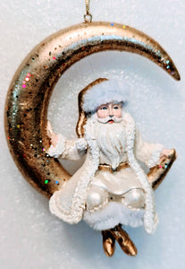 Ivory & Gold Santa Ornament Sitting on a Gold Moon