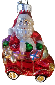 Glass Santa in a red car with presents 5 inches