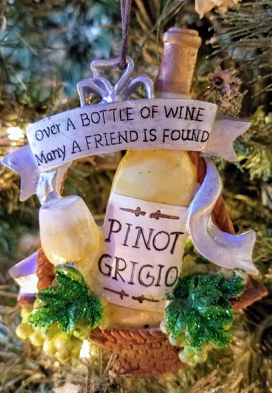 Pinot Grigio wine ornament- over a bottle of wine- many a friendship is found -resin 4.5