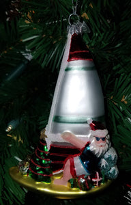 Glass Santa on a sailboat ornament Noble Gems 5.5"