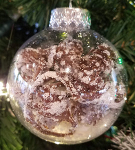 Acrylic ornament with pine cones & snow inside 4"