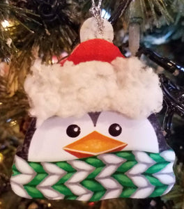 Wooden penguin head ornament w santa hat/green/white scarf 3"