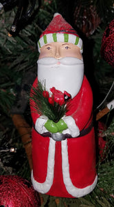 Santa figurine w bird/greenery resin 6"