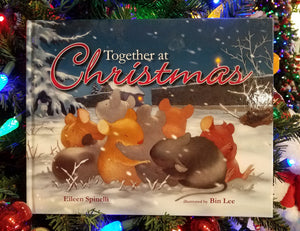 Together at christmas hard cover book / a family of 10 mice stay huddled together 11" x 9"