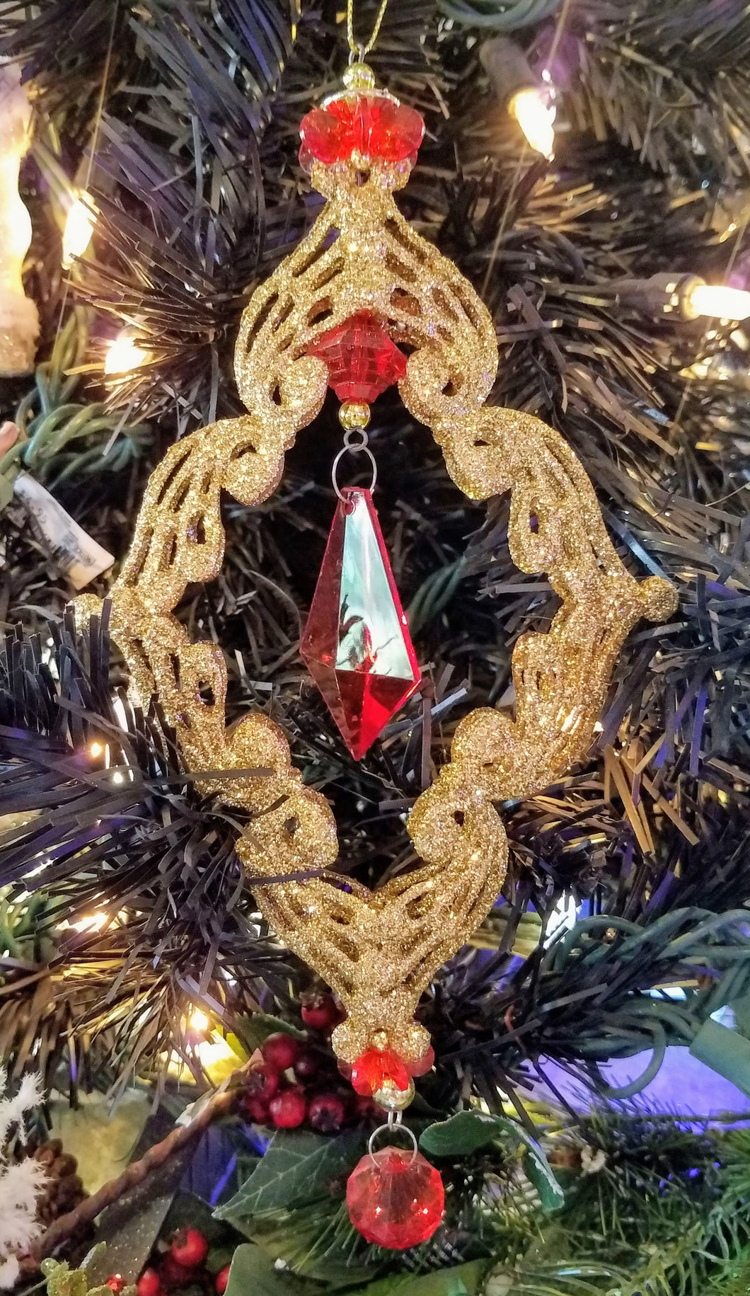 Acrylic gold ornament with red gems 8
