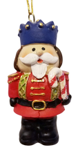 Load image into Gallery viewer, Red Nutcracker Ornament with Blue Hat Holding Candy Cane
