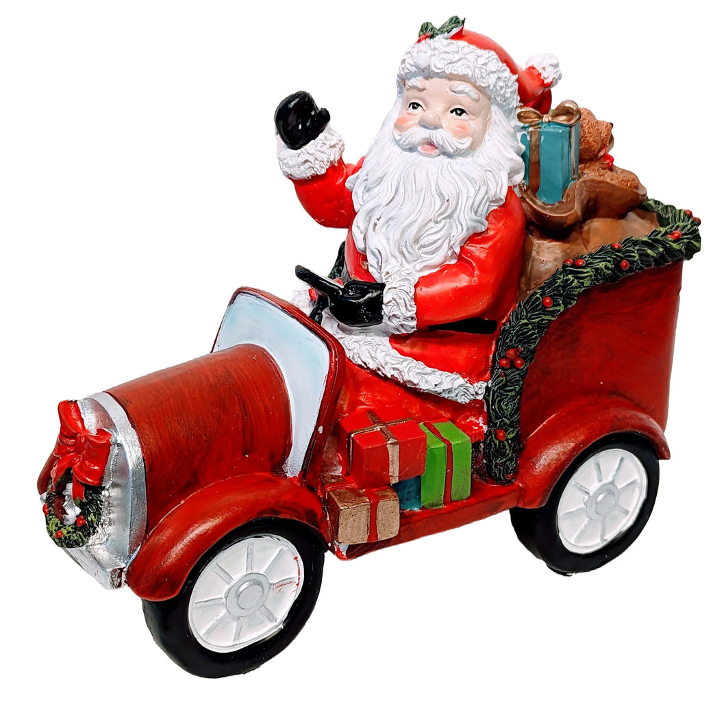 Santa Sitting In a Red Truck with Christmas Gifts Figurine