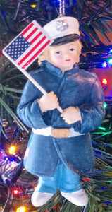 Little military boy ornament with American Flag resin 4"
