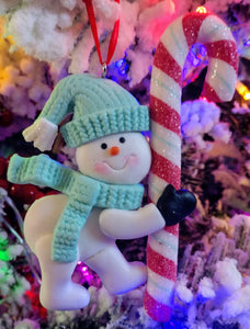 Snowman ornament with aqua blue hat/scarf/candy cane-resin 4"