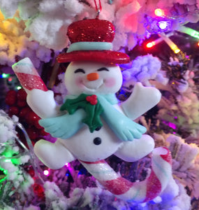 Snowman ornament with red hat/candy cane - resin 4"