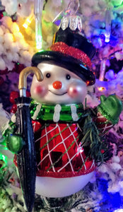 Glass snowman ornament with black umbrella/black hat/green scarf 4"