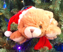 Load image into Gallery viewer, Plush Brown Bear Laying Down with Red Santa Hat &amp; Red Scarf 11&quot;x5&quot;
