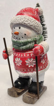 Load image into Gallery viewer, Skiing Snowman Figurine Wearing Red Jacket/Red Hat/Snowflakes with Backpack&amp; Tree
