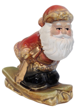 Load image into Gallery viewer, Ceramic Santa Figurine On Snowboard or Skis
