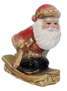 Ceramic Santa Figurine On Snowboard or Skis