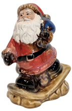 Load image into Gallery viewer, Ceramic Santa Figurine On Snowboard or Skis
