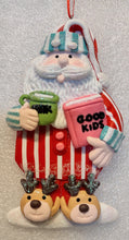 Load image into Gallery viewer, Clay Dough Santa or Snowman Ornament Wearing Pajamas
