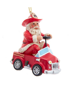 Fireman Santa Ornament Sitting In a Red Fire Truck
